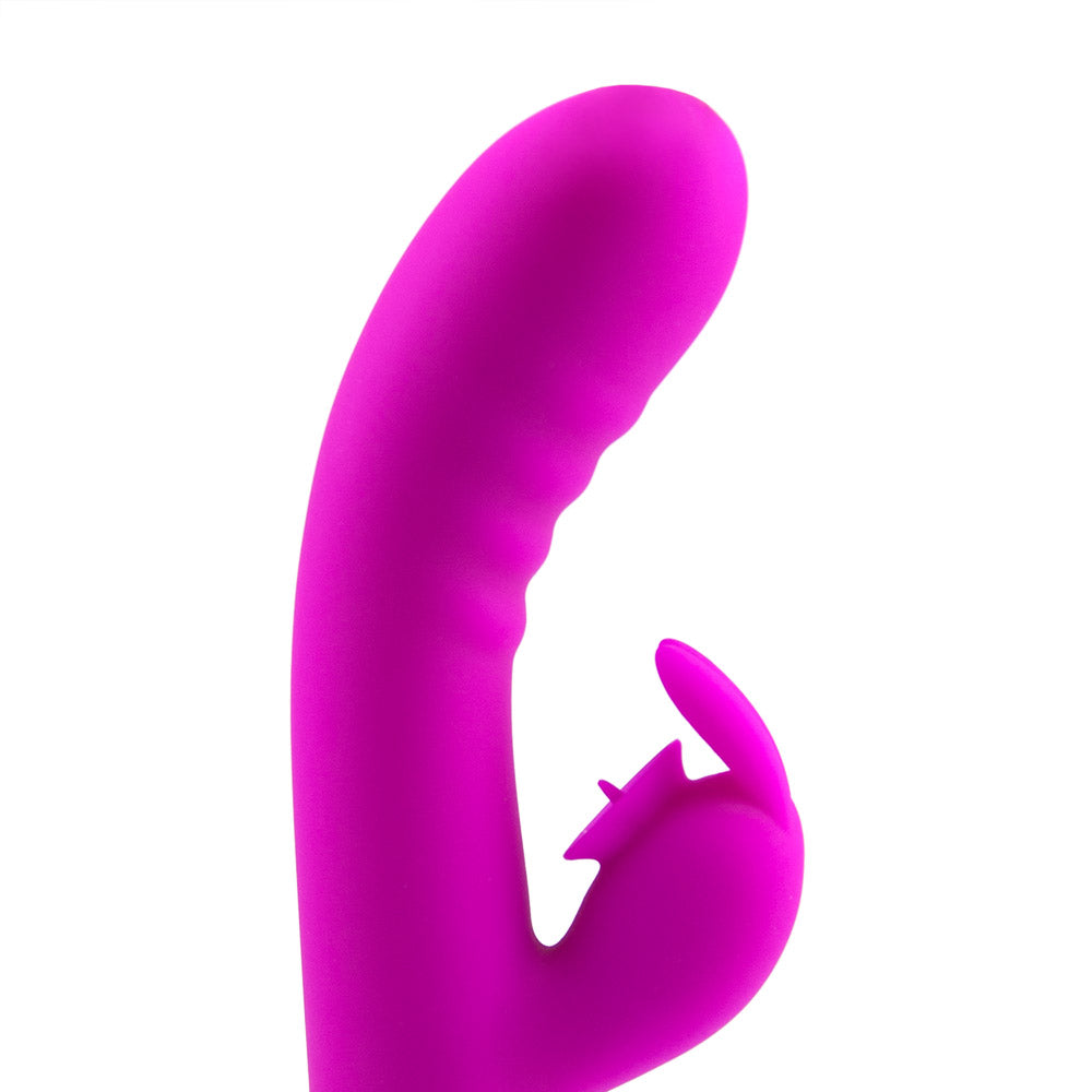 Dual pleaser Rabbit vibrator with licking stimulator